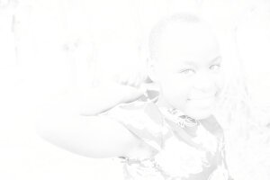 Stef Styles|Black and White|Indoor Mid Contrast - A little girl. Tanzania