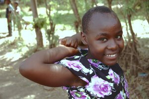 Stef Styles|The Traveller|Snowy Forest BRB-Triad - A little girl. Tanzania