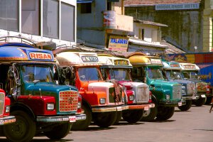 Stef Styles|Night|City lights with reflection - Some colourful busses. Colombo / Sri Lanka