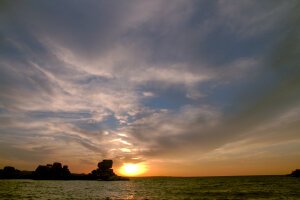 Stef Styles|Night|City lights with reflection - Sunset over lake Victoria. Kisumo / Tanzania